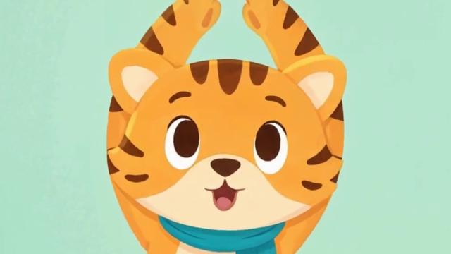 Tiggy smiling with arms up